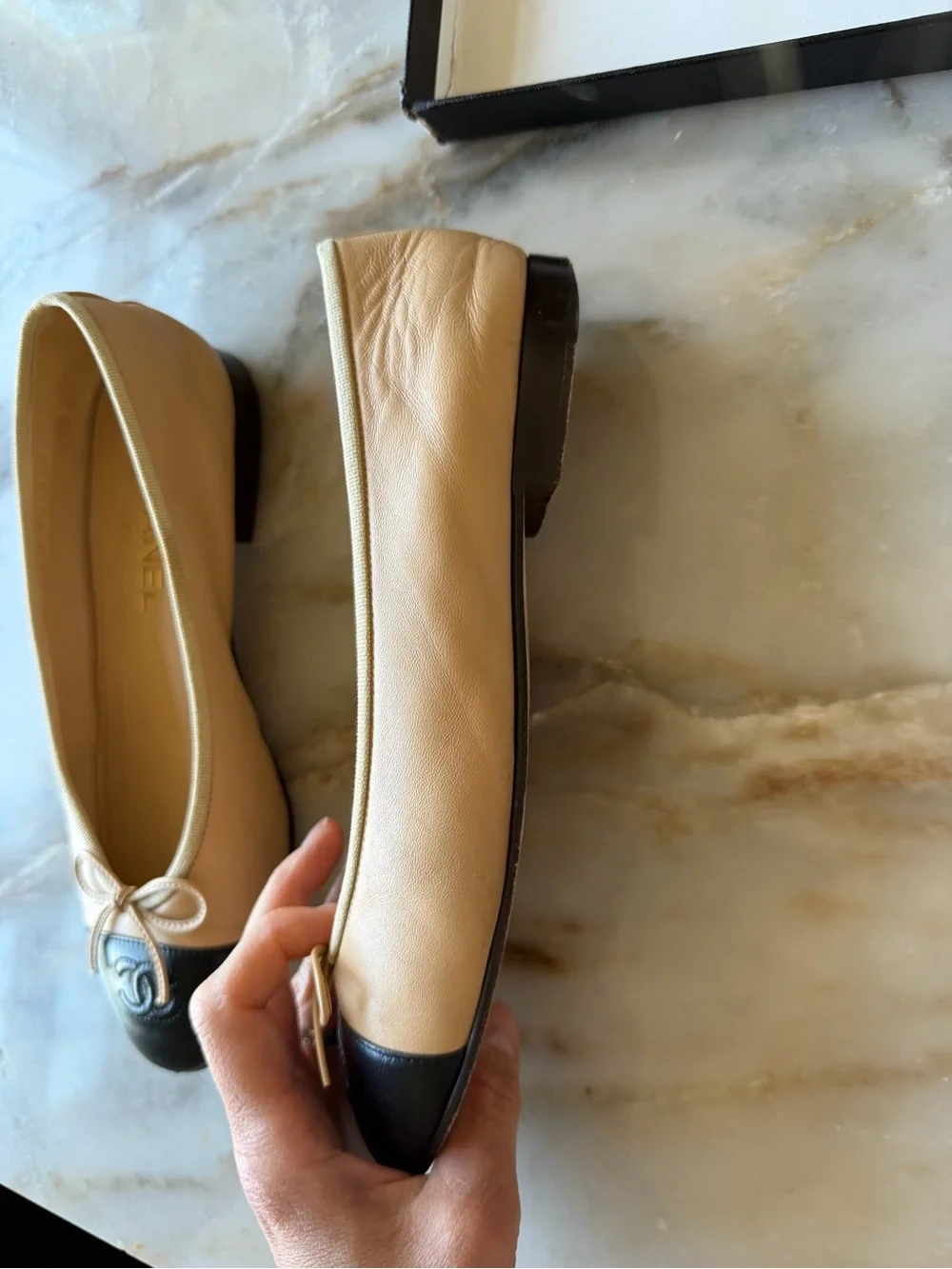 CHANEL Beige and Black Leather Cap-Toe Ballet Flats